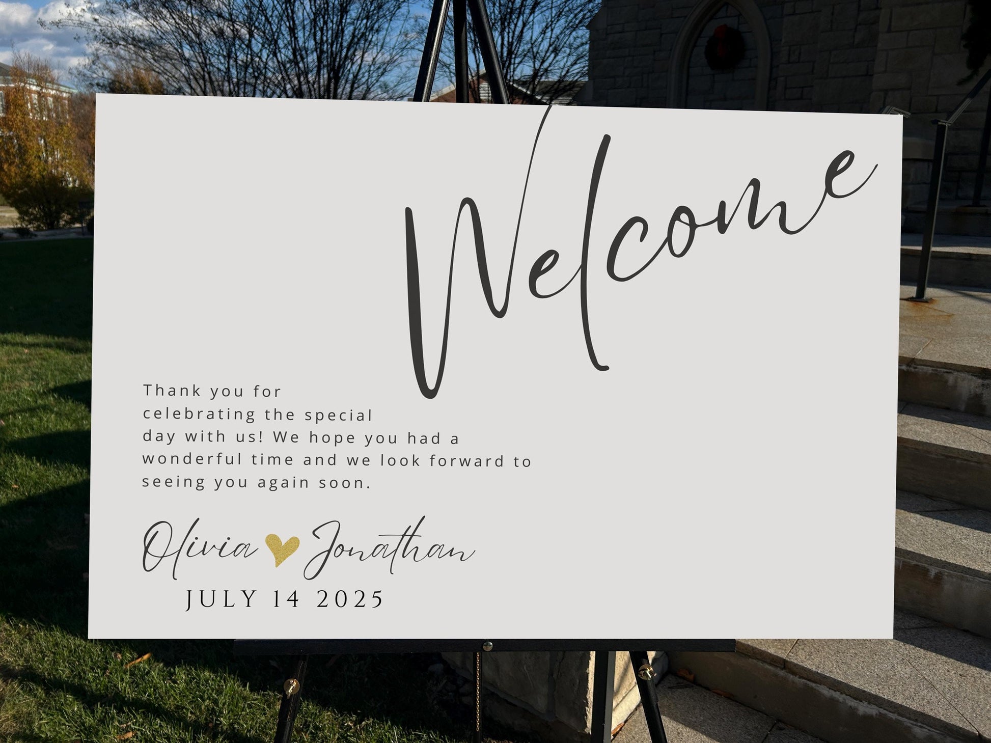 a welcome sign with a heart on it