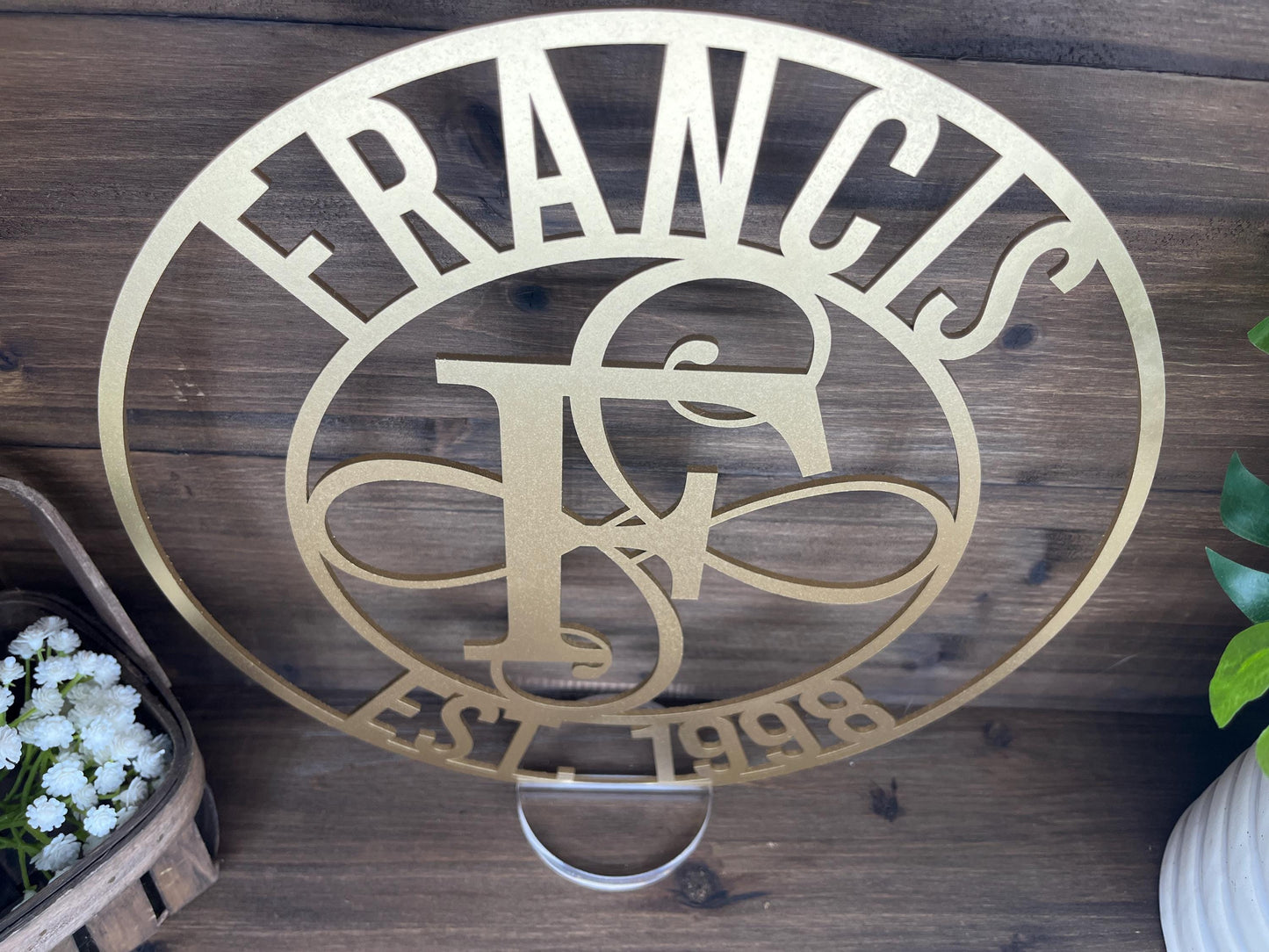 a metal sign with the word frances on it