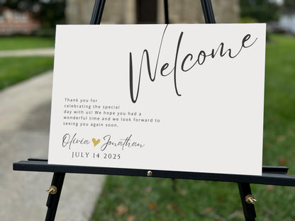 a welcome sign on a easel in front of a house