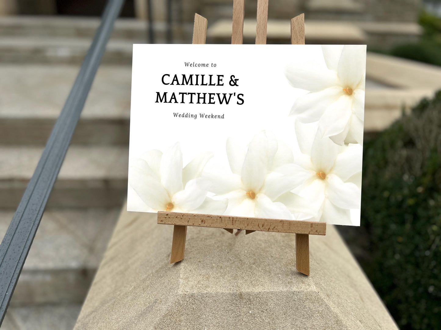 a sign that is sitting on top of a cement block