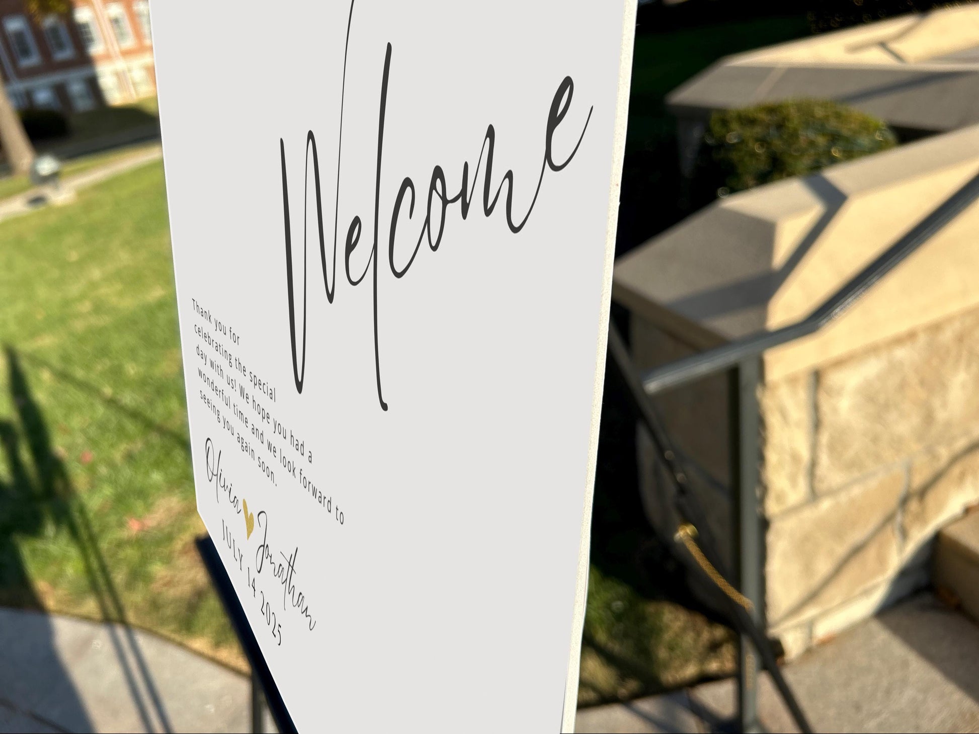a welcome sign in front of a building