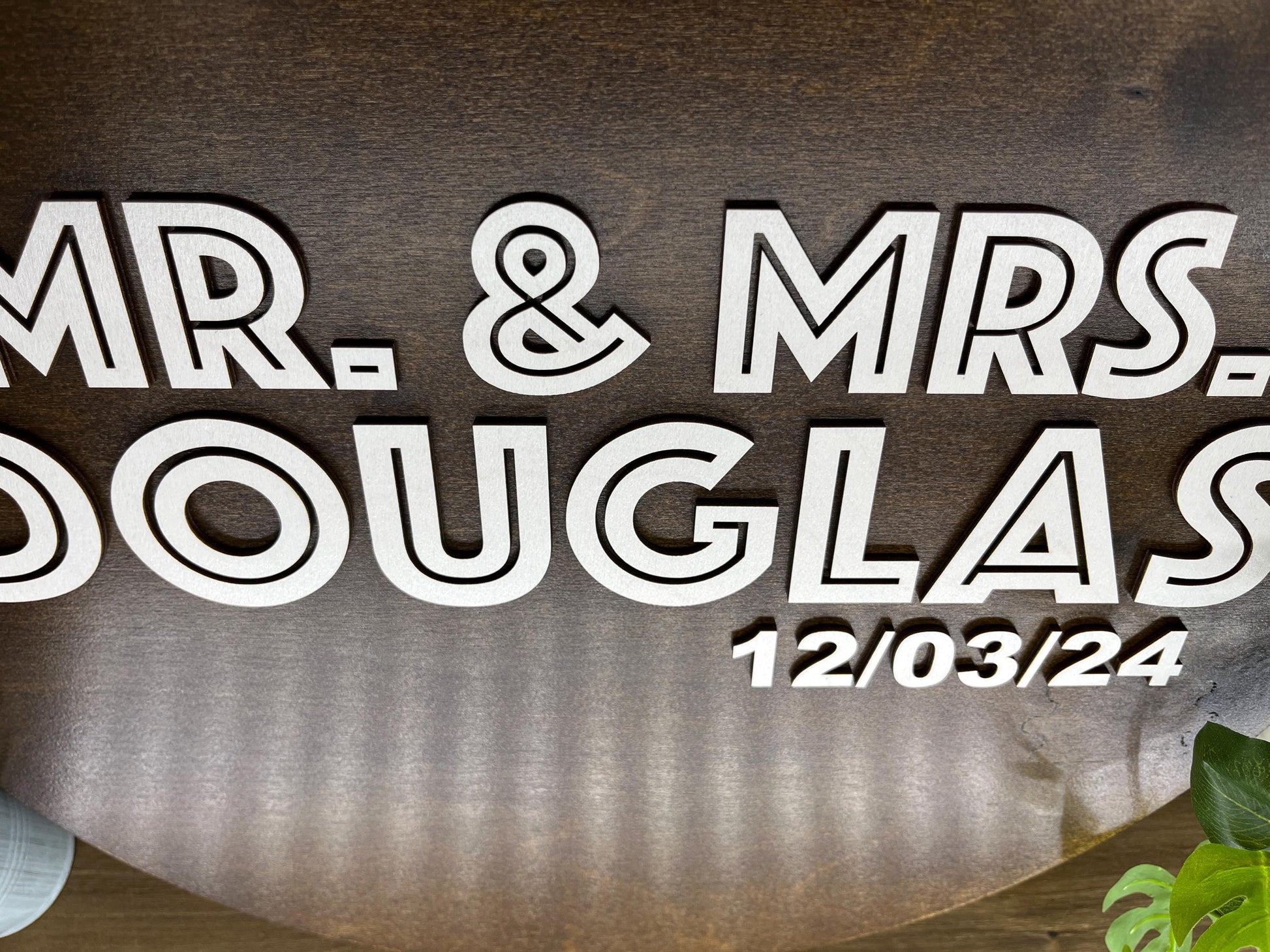 a wooden sign that says mr and mrs douglas