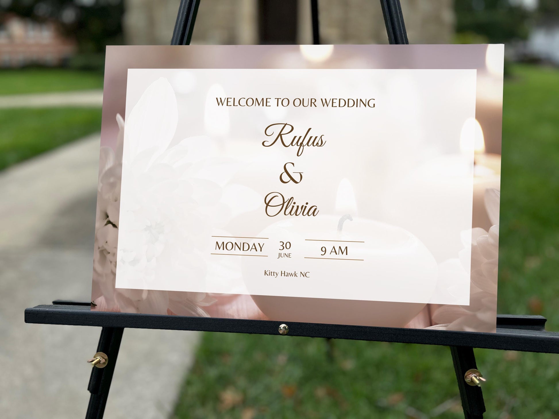 a welcome sign for a wedding in front of a house