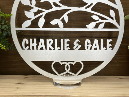 a metal sign that says charlie and gail on it